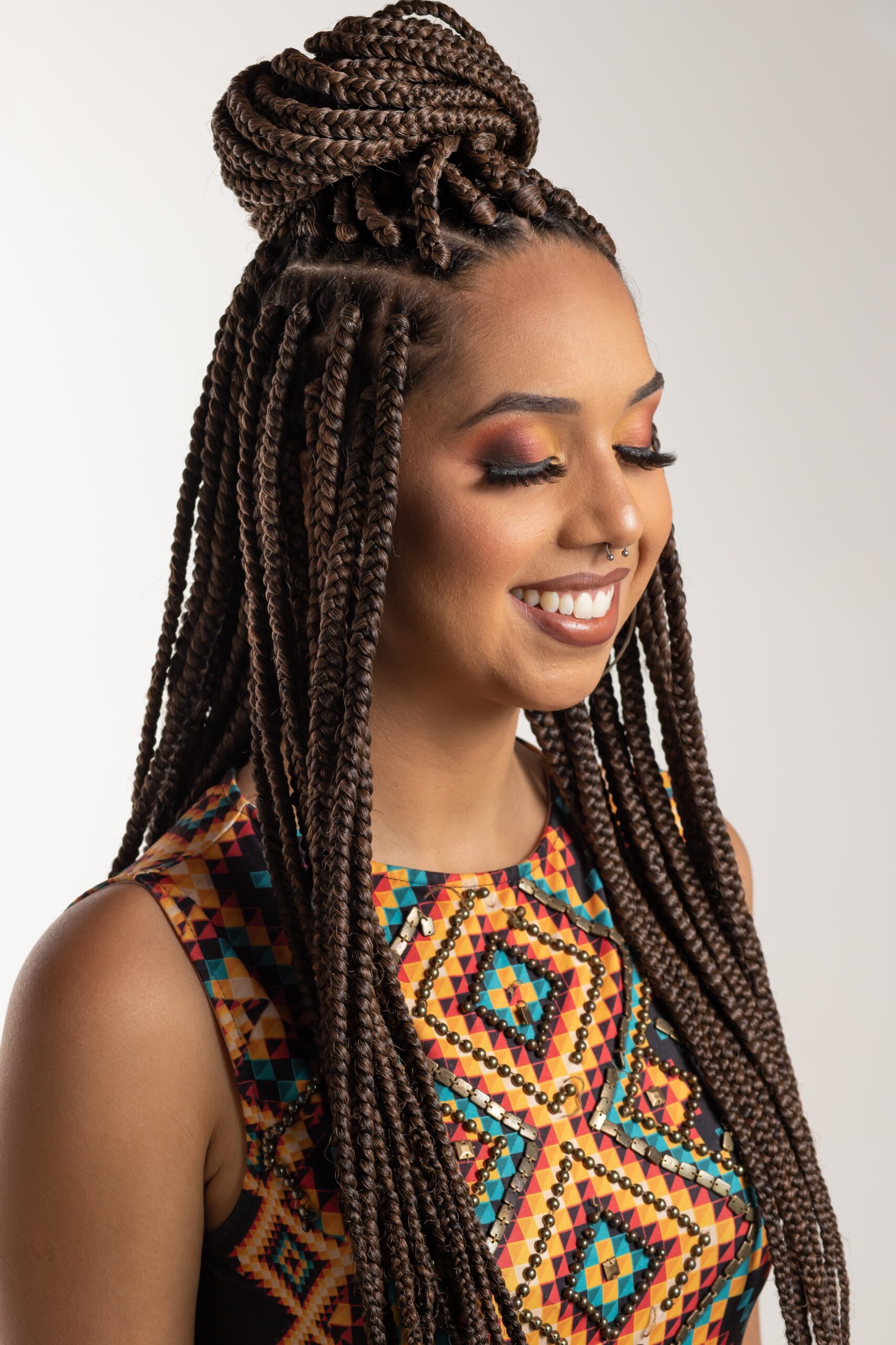 Box Braids: How to Care for Your Hair & Install According to A Stylist